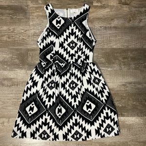 Sugarlips sleeveless black and white dress with back cut out